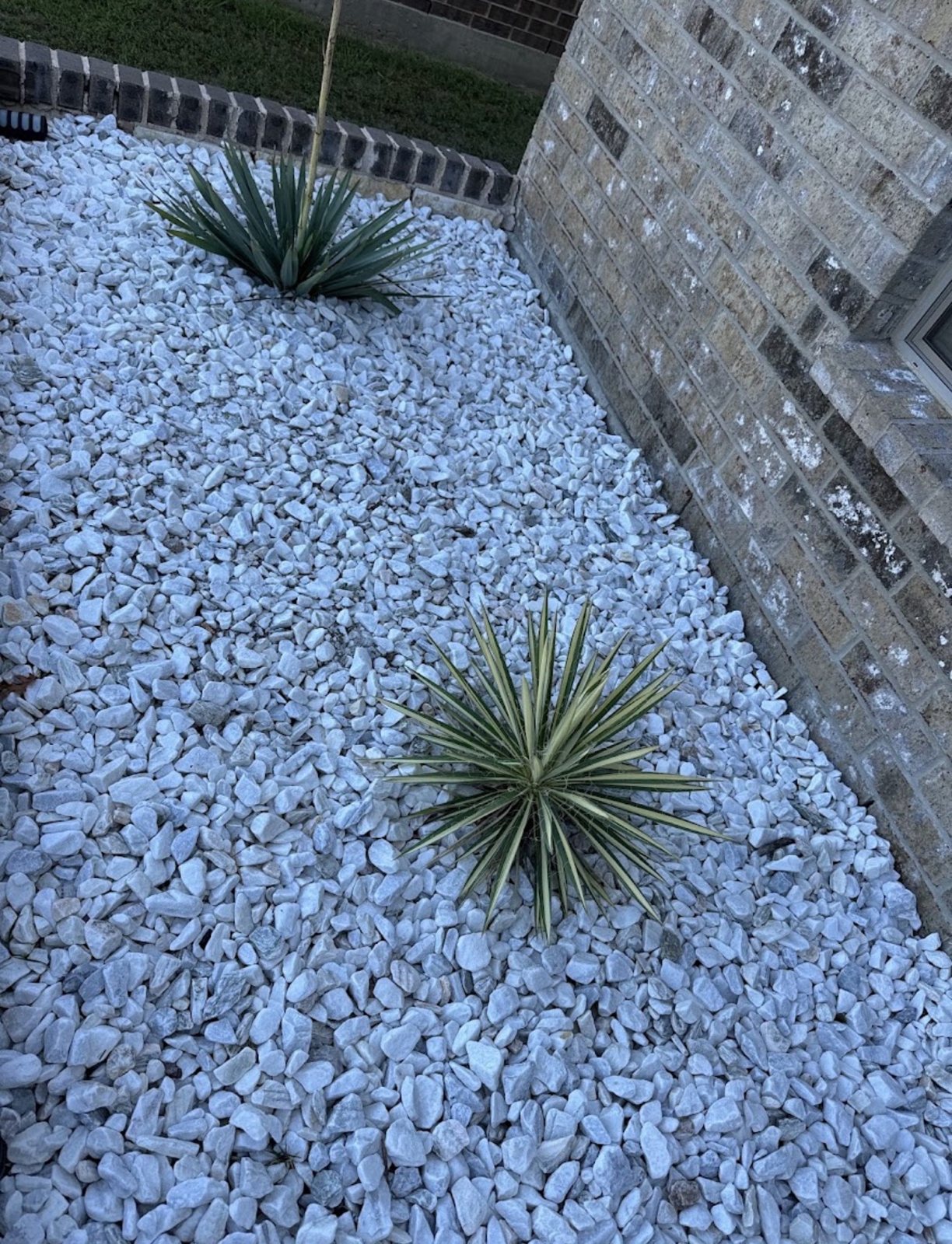 Decorative white rock landscape installation
